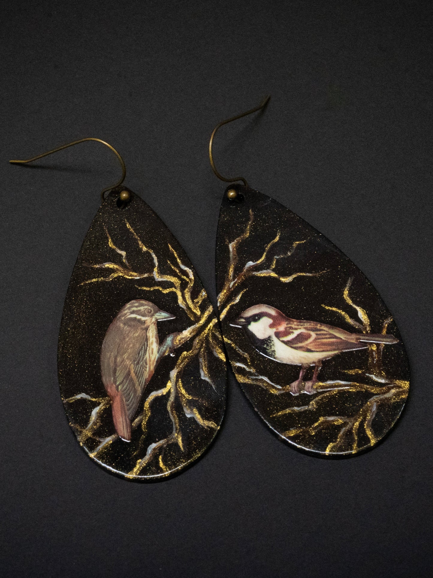 Sparrows Perched on Gold Branches